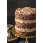 6-inch three-layer chocolate cake with buttercream frosting